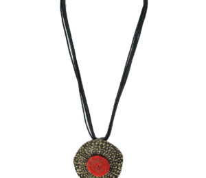 Etched Brass Pendant with Coral Center, Hanging on Black Strands