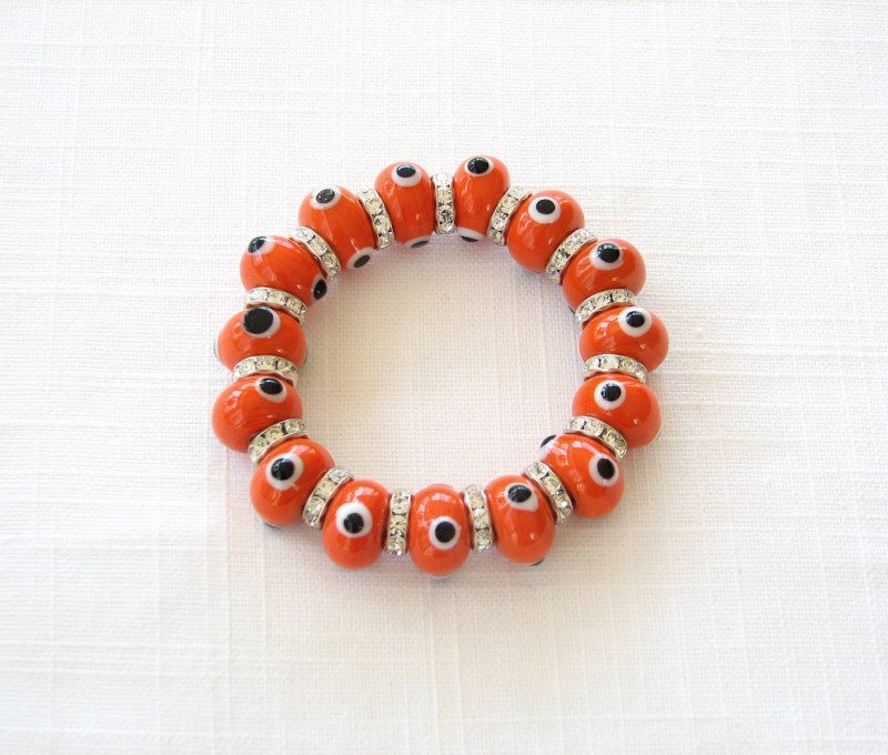 Orange, White, and Black Lamp Work Bracelet with Rhinestones