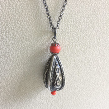 IMG_6412antique silver red pdnt. single on beige C.U.